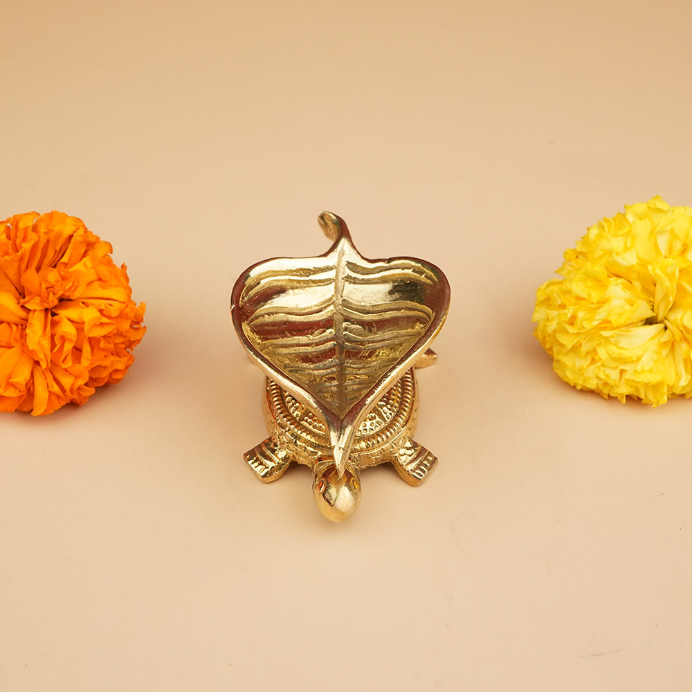 Brass Peepal Leaf Diya on Kurma