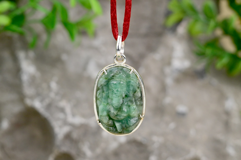 Emerald Ganesh (28.70 carats) in Silver Locket