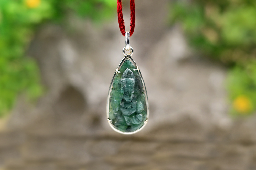 Emerald Ganesh (36.70 carats) in Silver Locket