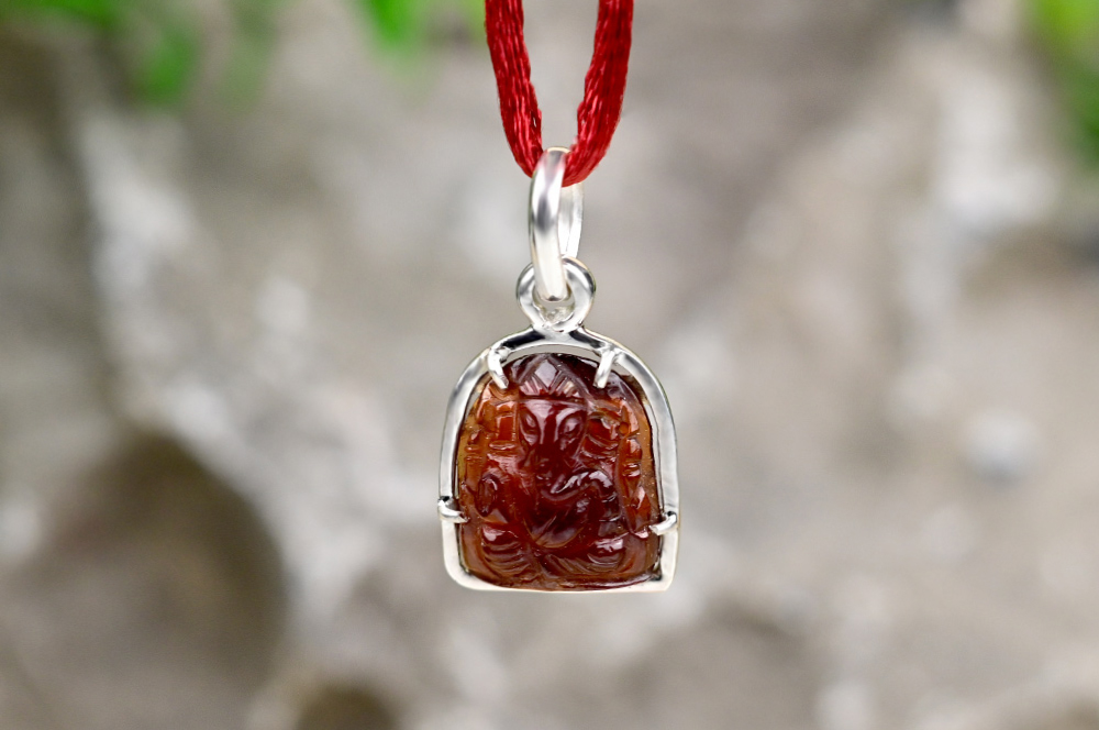 Gomed Ganesh (10.05 carats ) in silver locket