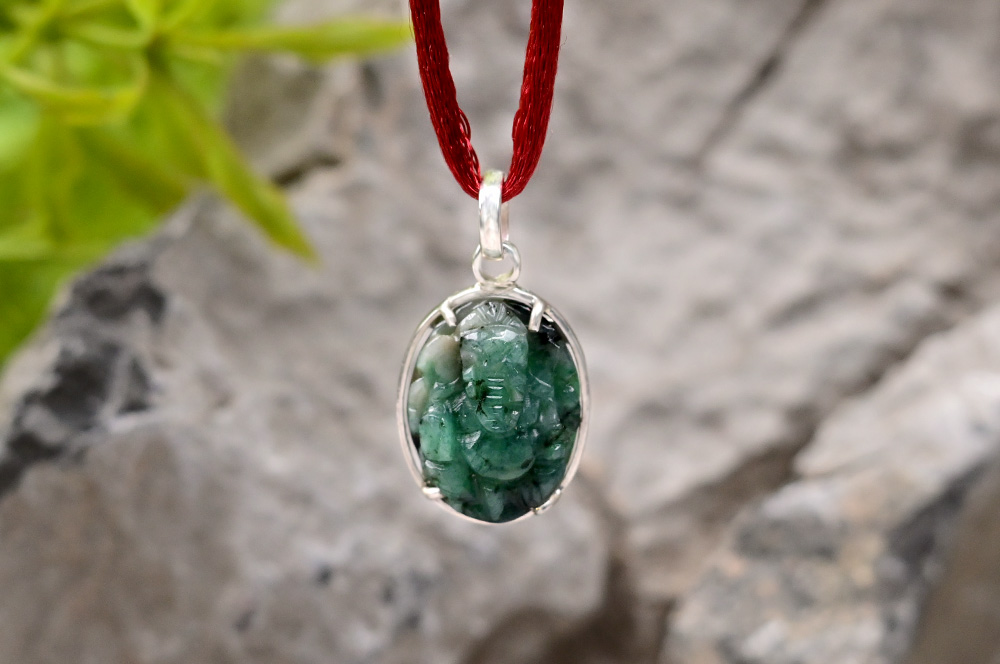 Emerald Ganesh (14.15 carats) in Silver Locket