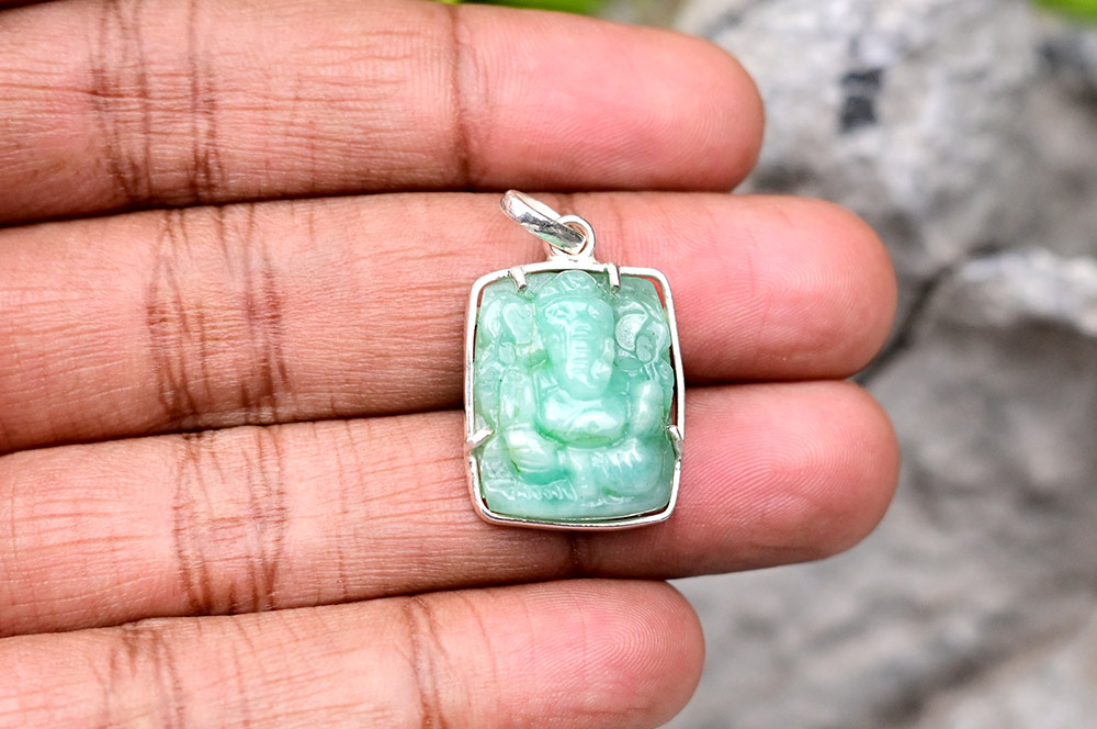 Emerald Ganesh (16.85 carats) in Silver Locket