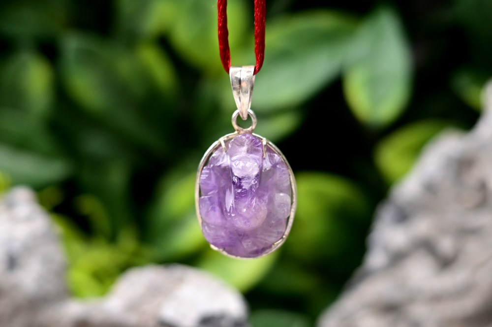 Amethyst Ganesh (10 gms ) in silver Locket
