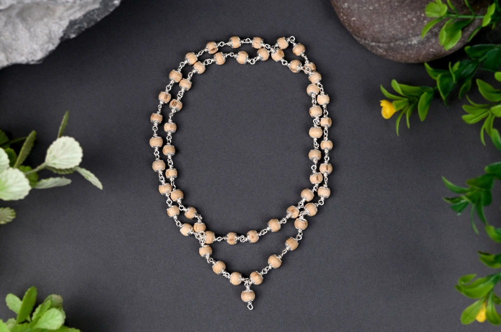 White Tulsi Mala in silver flower caps