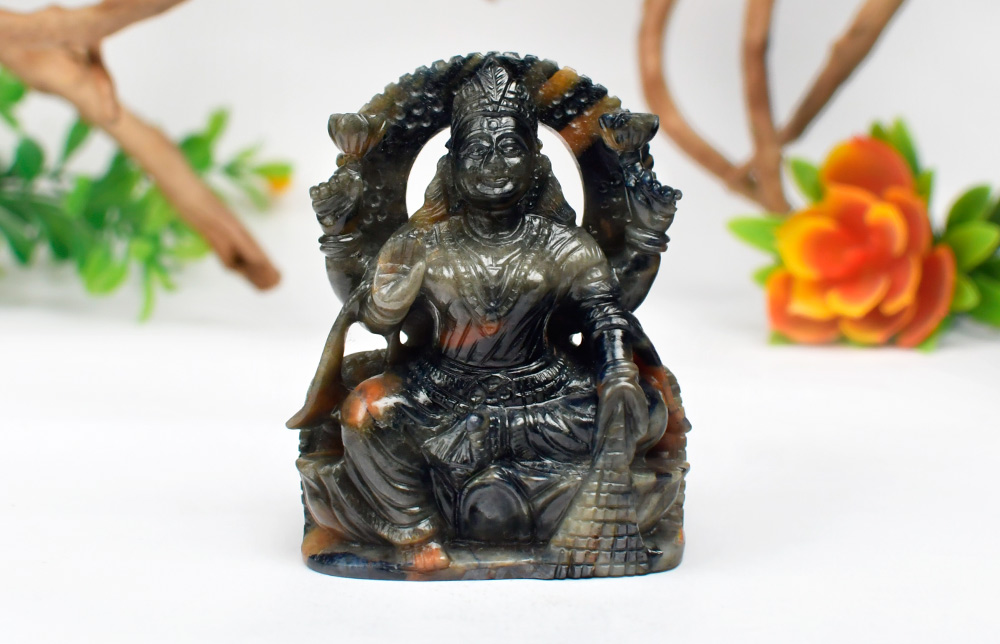 BL83-Blue Sapphire Laxmi Devi Idol - 1119.40 carats