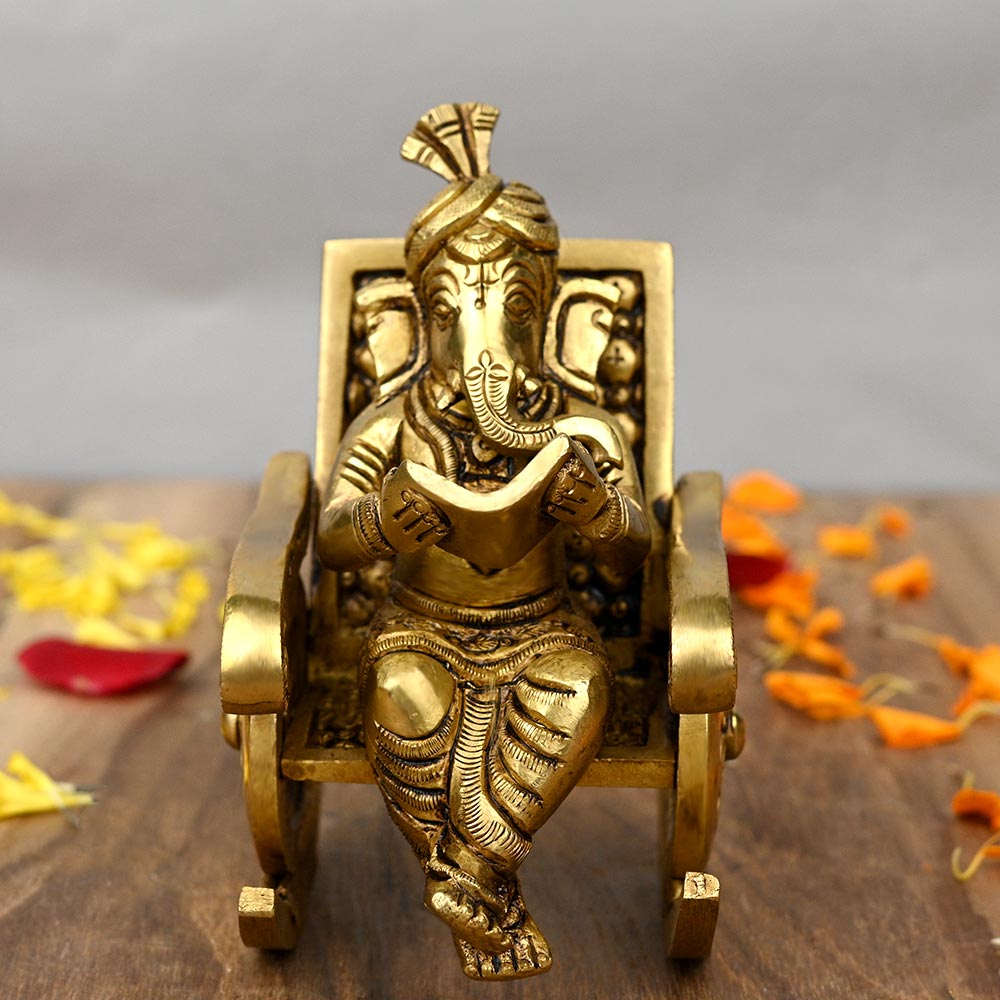 Ganesha Reading Grantha on Chair Brass Idol