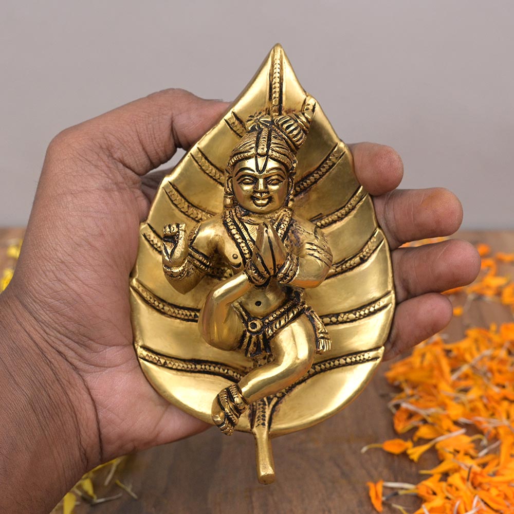 Krishna on Leaf in Brass