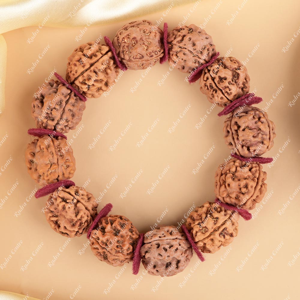 Buy 3 Mukhi Nepali Rudraksha Woolen Spacers Bracelet from Rudra Centre (Rudraksha Ratna) at reasonable prices.