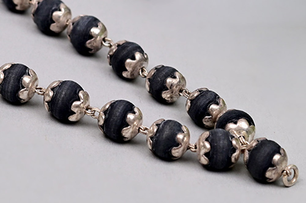 Black Tulsi Mala in Silver Flower Caps