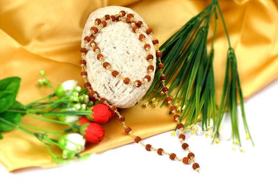 Rudraksha mala - 8 mm in gold polished copper caps