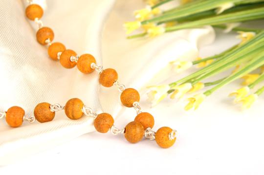 Turmeric mala in silver with knots