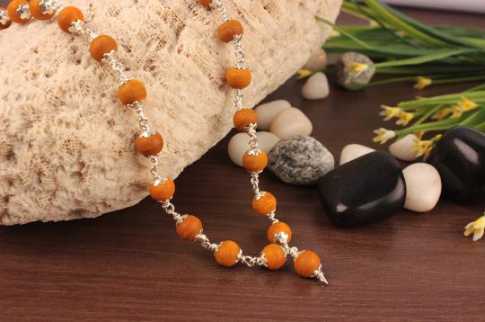 Tumeric mala in silver with caps