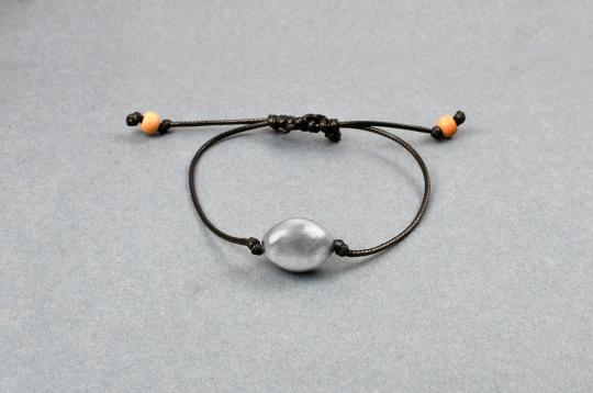 Lingam shape Parad Gutika bracelet in thread