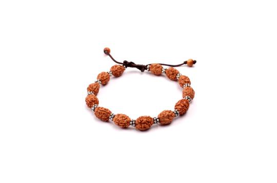 3 mukhi Mahajwala bracelet from Java with silver chakri in thread