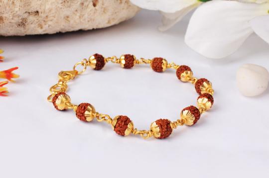 Rudraksha punchmukhi bracelet with gold flower caps