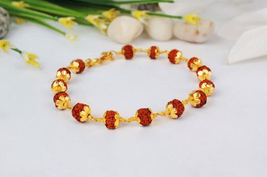 Rudraksha Bracelet in gold with flower design caps