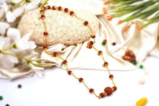 Rudraksha Mala in gold with flower designer caps - 9mm