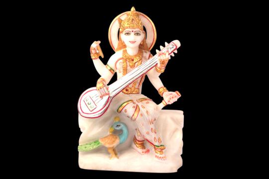 Goddess Saraswati idol in white marble - 12 inches
