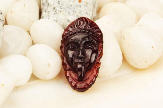 Kaali Face in Gomed - 21.55 Carats