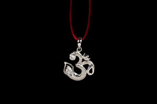 Om Locket in Pure Silver with stonework