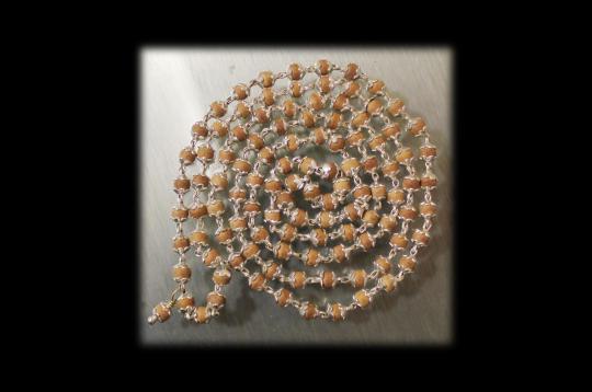 Sandalwood mala in silver with flower caps