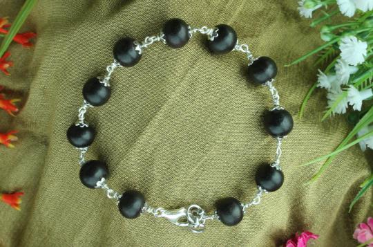 Black Ebony Bracelet in silver flower caps
