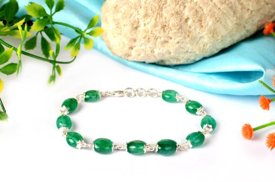 Emerald Bracelet in silver caps