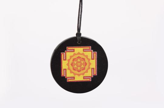 Baglamukhi Yantra locket on Rosewood
