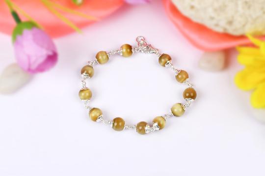 Cats Eye Bracelet in pure silver flower caps