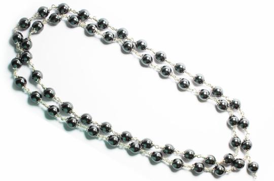 Hematite Mala in pure silver flower caps