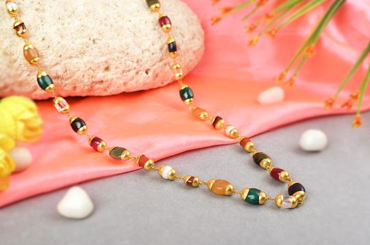 Navratna mala precious gems in gold caps