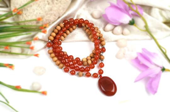Orange Carnelian and White Sandal beads Mala