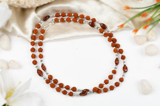 Rudraksha and Hessonite Gomed mala with silver spacers and balls