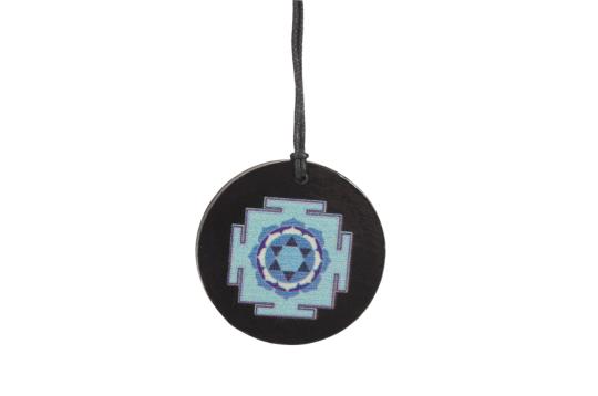 Saraswati Yantra locket on Rosewood