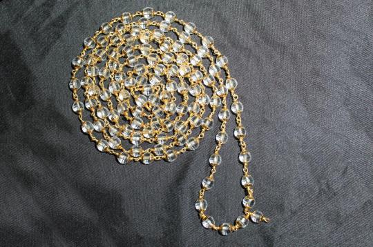 Sphatik Diamond cut mala in gold - 6mm