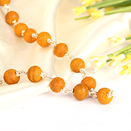 Turmeric mala in silver with knots