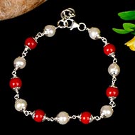Pearl and  Coral bracelet with Silver caping