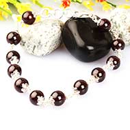 Garnet Bracelet in pure silver flower caps - 8mm
