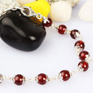 Gomed Bracelet in pure silver flower caps - 6 mm