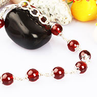 Gomed Bracelet in pure silver flower caps - 7mm