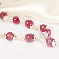 Ruby Faceted Mala in Pure Silver Flower Caps - 6 mm