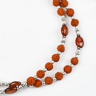 Rudraksha and Hessonite Gomed mala with silver spacers and balls