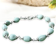 White Vaijayanti Bracelet in pure silver flower caps