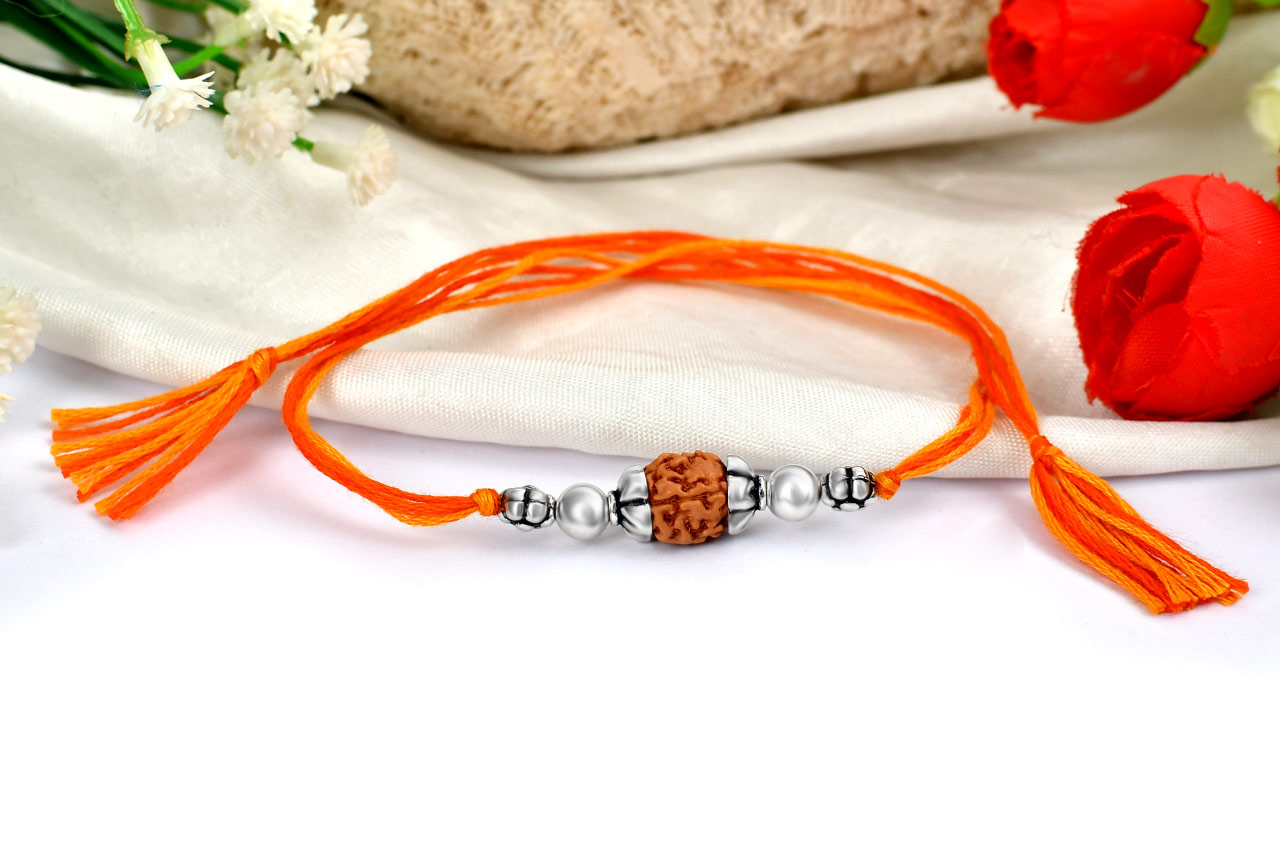 4 mukhi Rakhi with pure silver accessories in thread - ii