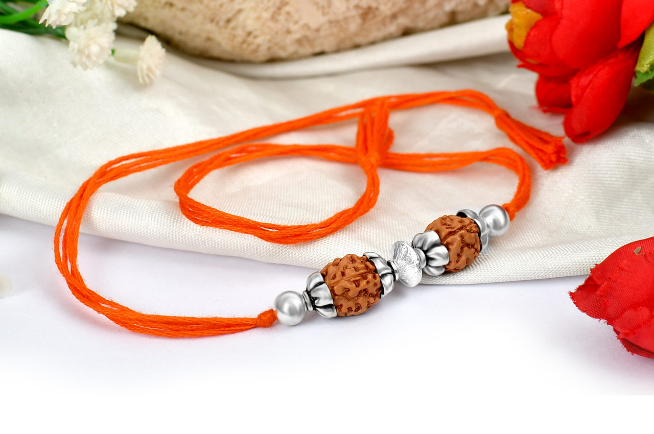 4 mukhi Rakhi with pure silver accessories in thread - III