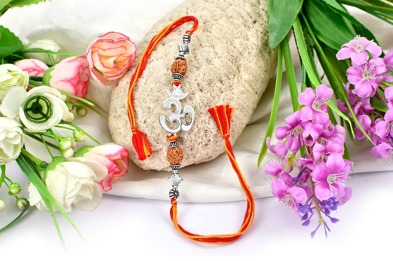 4 mukhi Rakhi with pure silver accessories in thread - IV