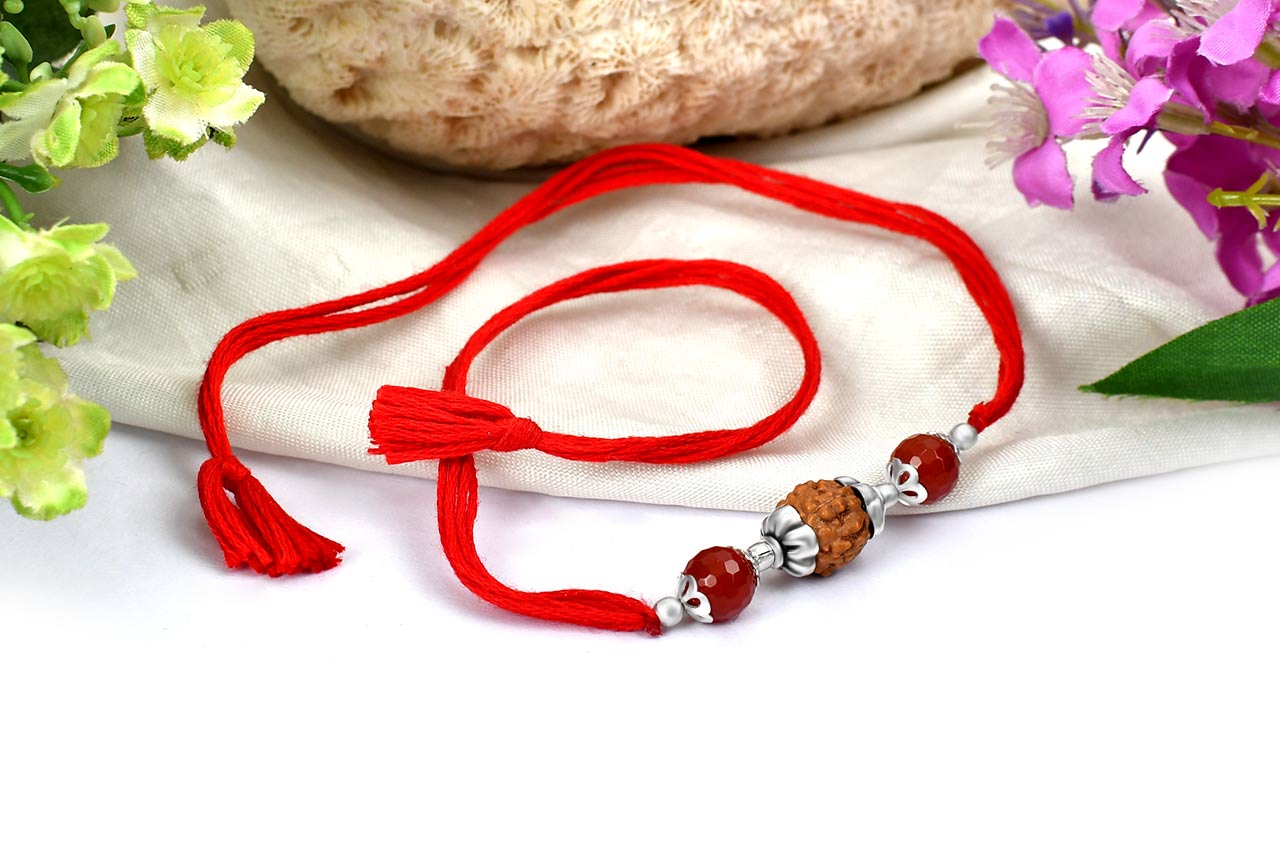 6 mukhi Rakhi Carnelian beads with pure silver accessories in thread