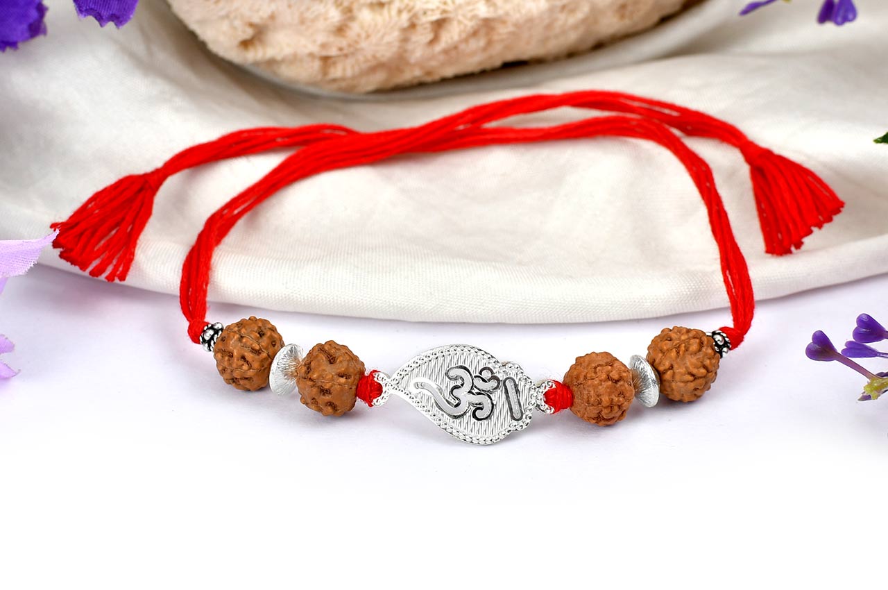 6 mukhi Rakhi with pure silver accessories in thread - I