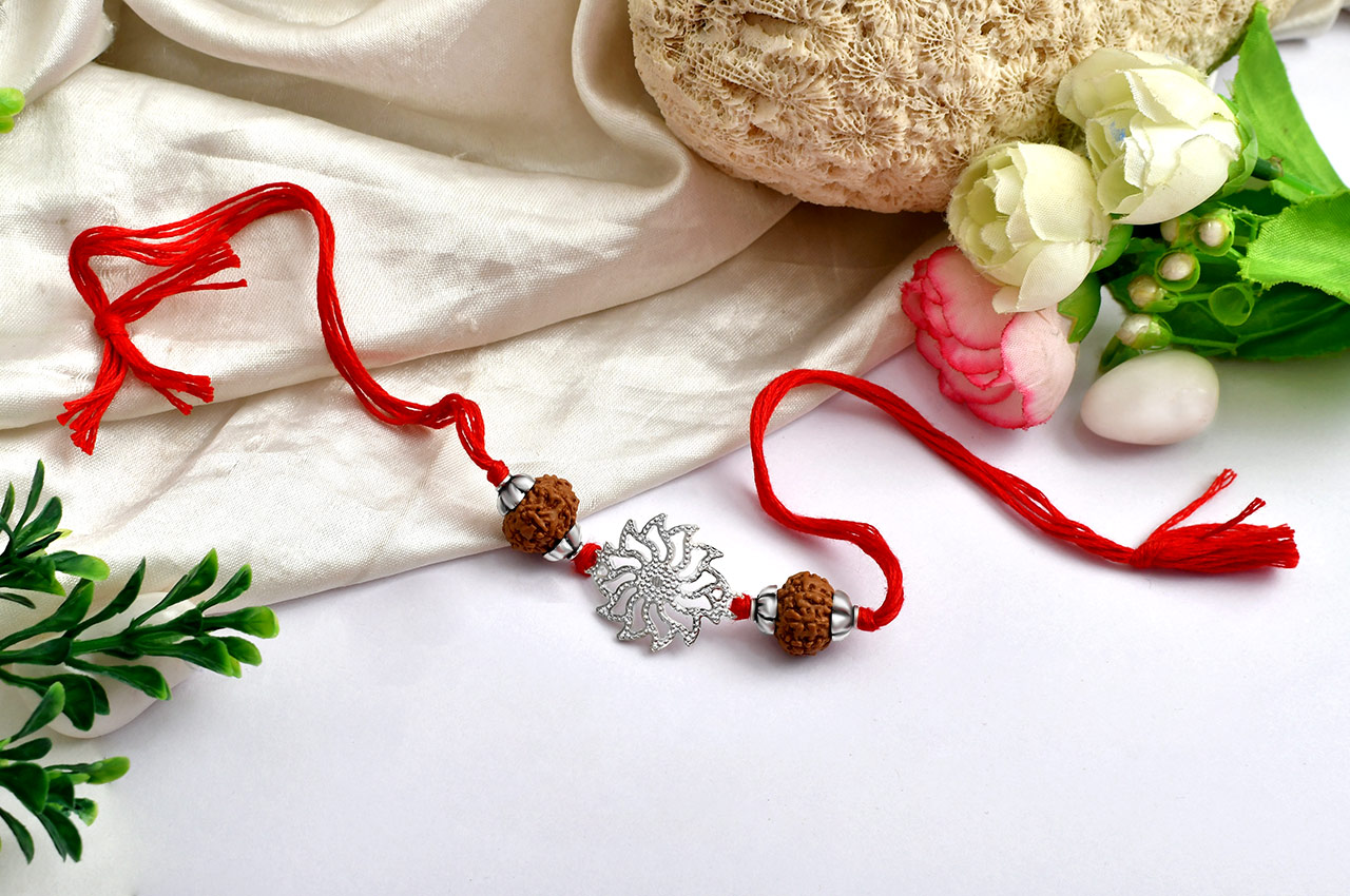 8 mukhi Rakhi with pure silver accessories in thread