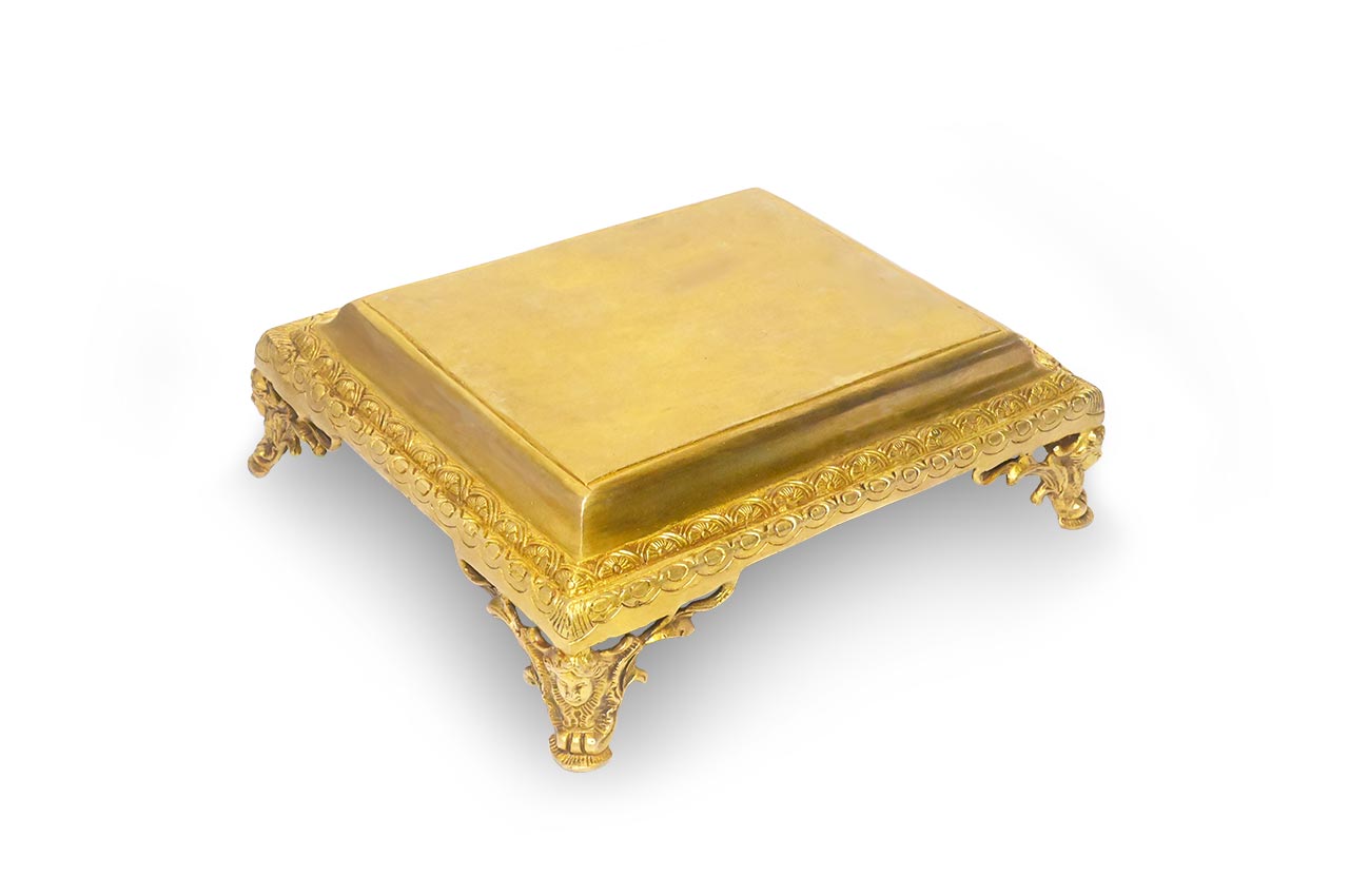 Ornate pedestal in heavy brass